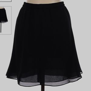 AJ Bari flowy, black skirt with hidden back zipper. size 8